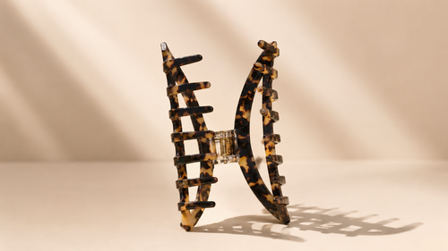 Avela XL Claw Clip open in studio